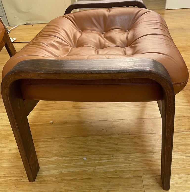 Pair of Swedish Modern Ergonomic Chairs with Matching Ottomen